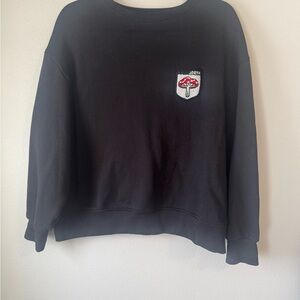 Jorya Black Crewneck Sweatshirt with Embroidered Patch